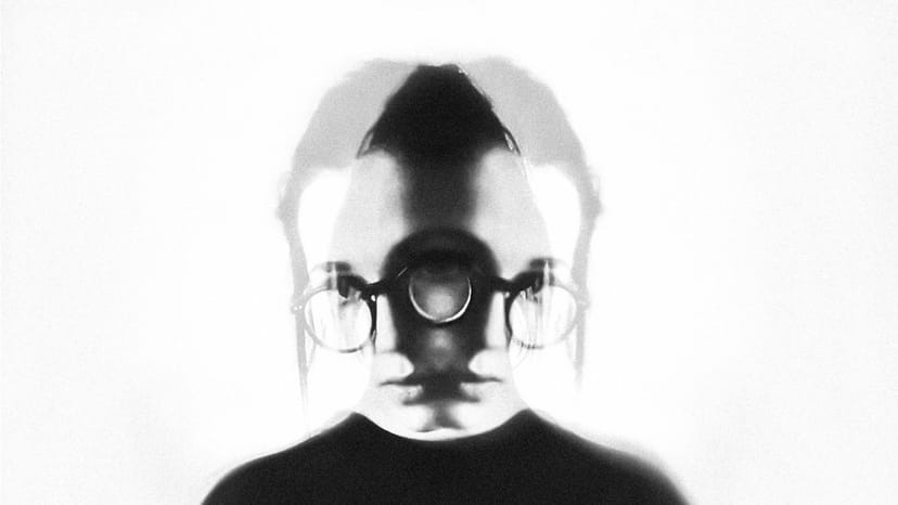 A person standing at the window